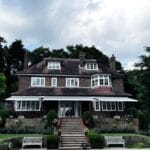 A large house with an awning as installed by Great British Awnings