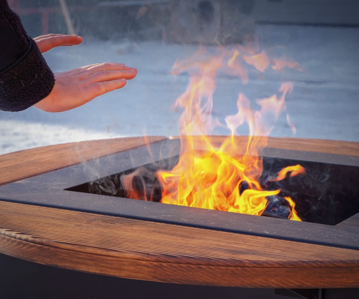 A firepit keeping a garden warm