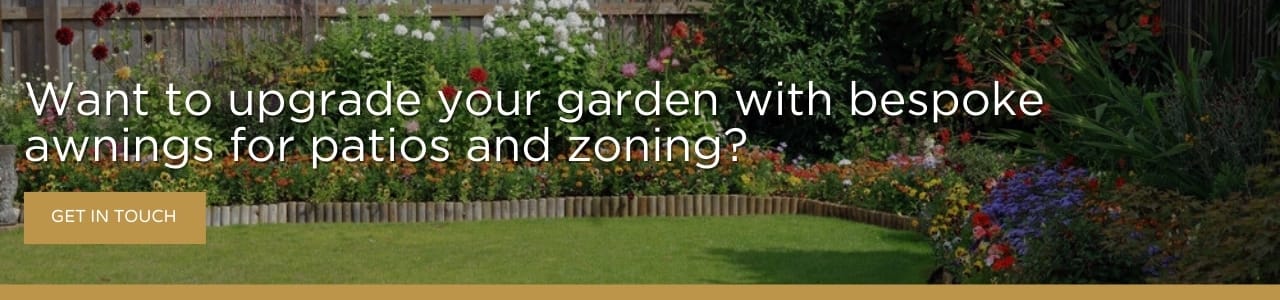 Want to upgrade your garden with bespoke awnings for patios and zoning: landscaped garden with structured planting beds and lawn creating defined outdoor spaces