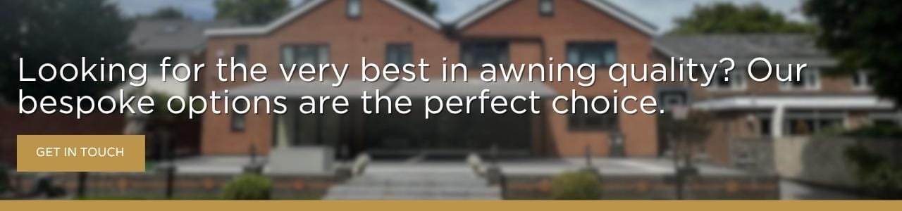 Looking for the very best in awning quality? Our bespoke options are the perfect choice: A wide promotional banner with white text reading "Looking for the very best in awning quality? Our bespoke options are the perfect choice." overlaid on a blurred image of a red-brick property, with a gold "Get in Touch" button in the lower left.