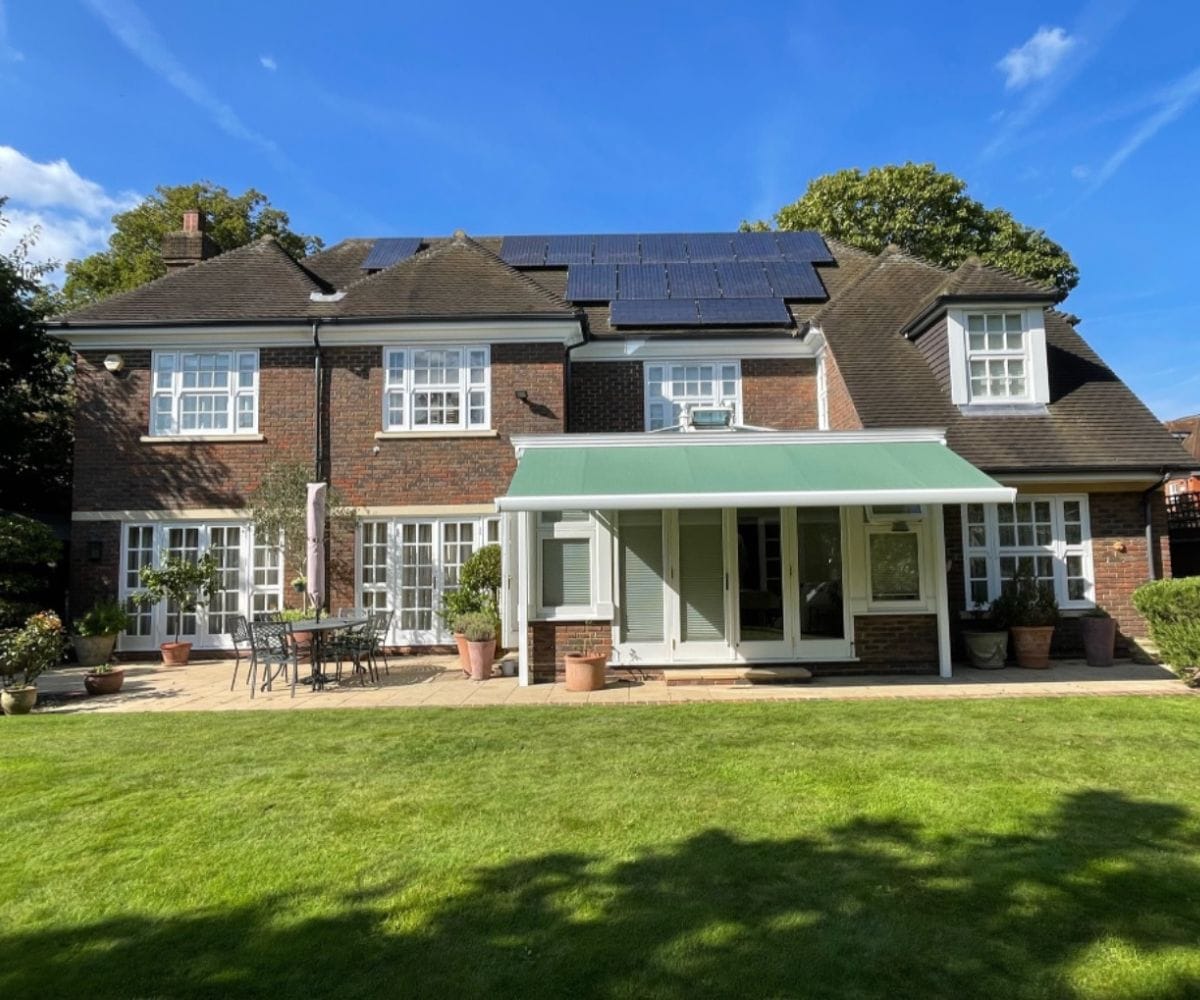solution-dyed acrylic awning: a solution-dyed acrylic awning on a large house as installed by the Great British Awning and Blind Company