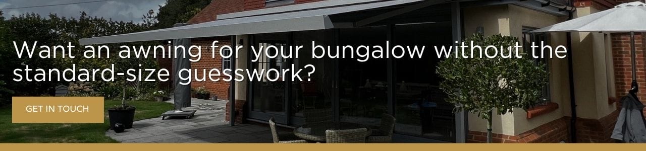 Want an awning for your bungalow without the standard-size guesswork: A banner advertisement showing a grey awning extended over a patio beside a house, with white text reading "Want an awning for your bungalow without the standard-size guesswork?" and a gold "Get In Touch" button.